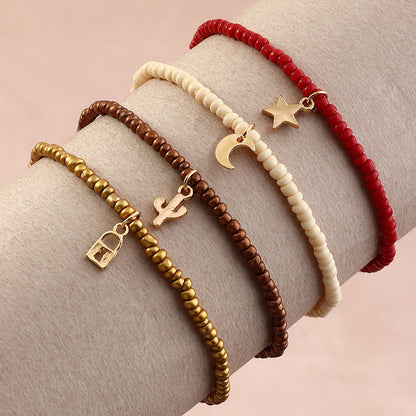 Conjunto de tobilleras con candado bohemio, estrella creciente y cactus