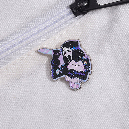 Broche en forme de chaton tenant un fantôme de dessin animé pour Halloween