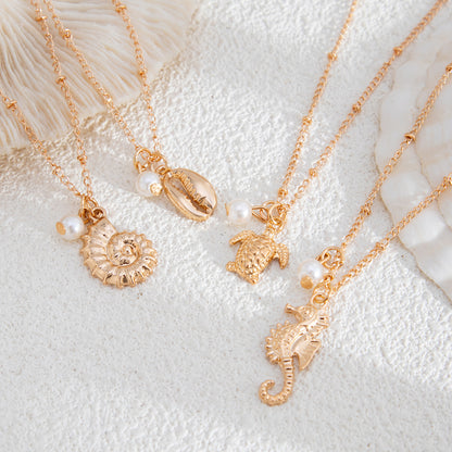 Conjunto de collar de perlas de aleación con diseño de tortuga y caballito de mar para mujer
