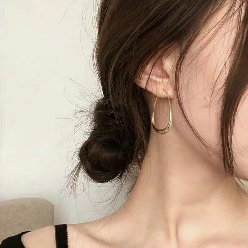 Exaggerated Elliptical Copper Earrings