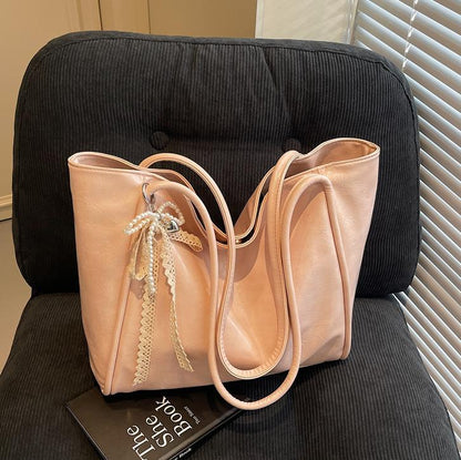 Bolso tote retro de piel encerada con aceite para mujer con colgante de lazo