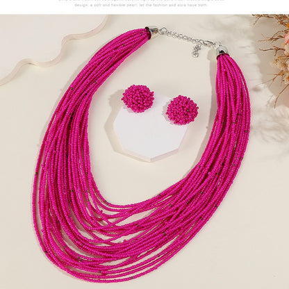 Conjunto de collar y pendientes con cuentas de arroz multicapa estilo bohemio para mujer