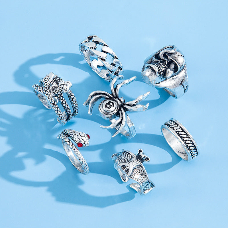 Conjunto de anillos de esqueleto gótico punk creativo de dos cabezas para mujer