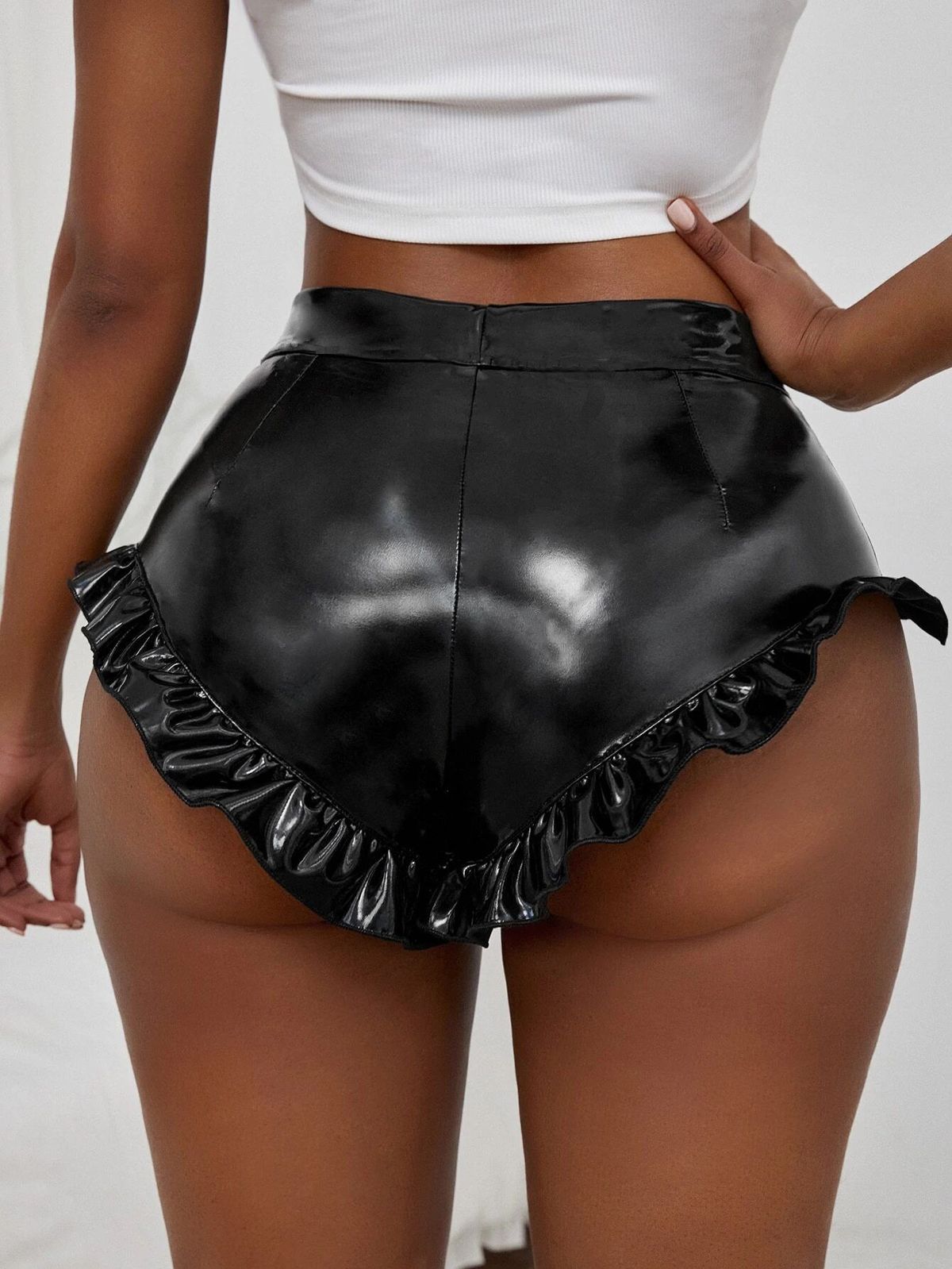 Pantalones cortos de cuero sintético de color liso sexys a la moda para mujer