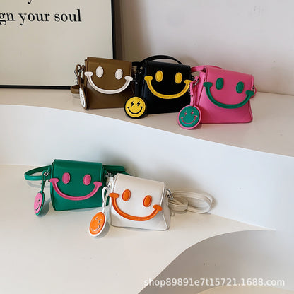 Lindo bolso bandolera mini con carita sonriente de dibujos animados