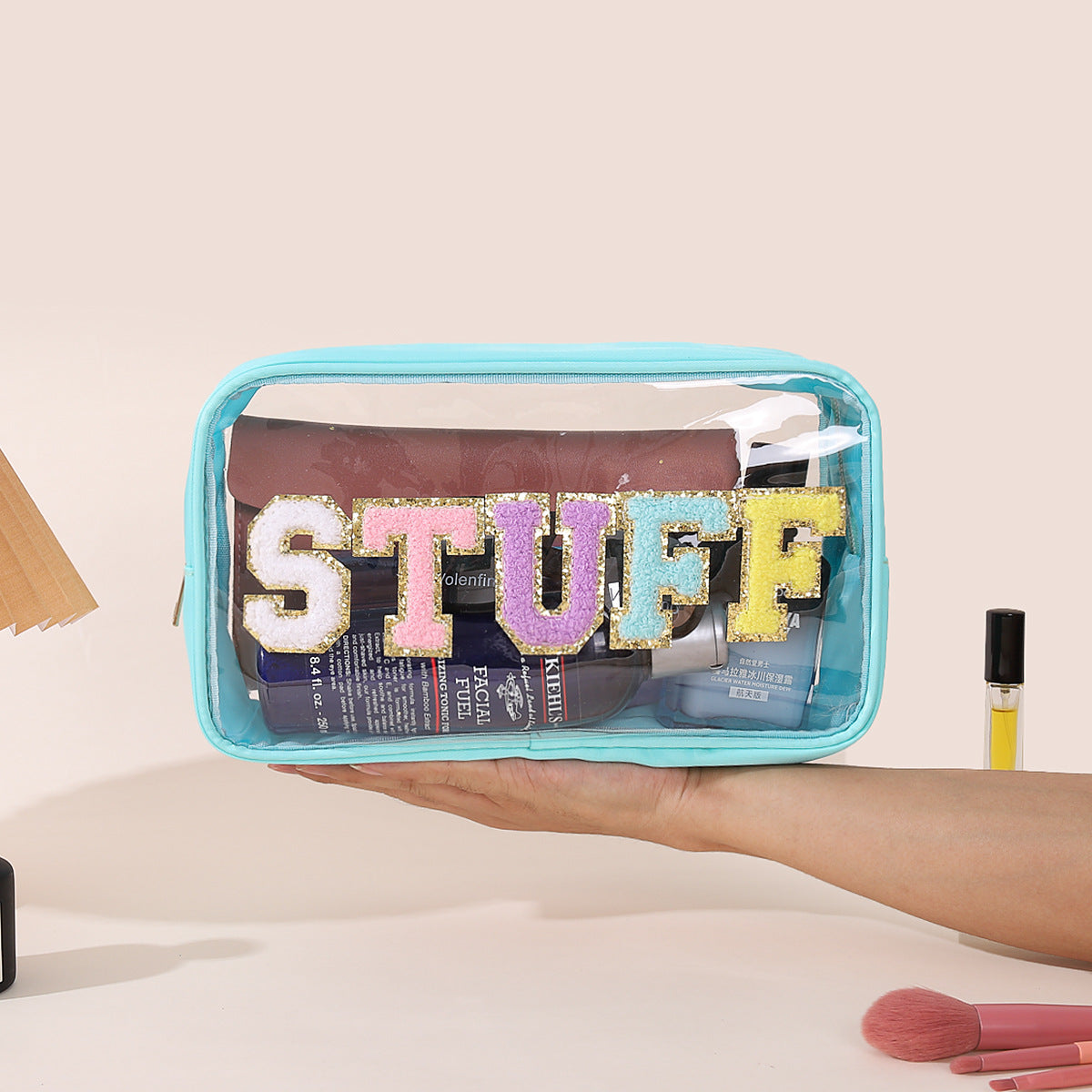 Bolsa de cosméticos impermeable de PVC transparente con letras bordadas