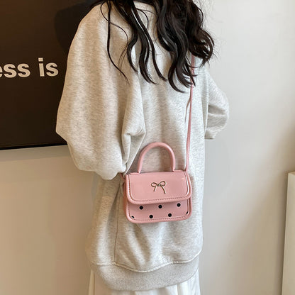 Mini bolso bandolera cuadrado con lazo de moda