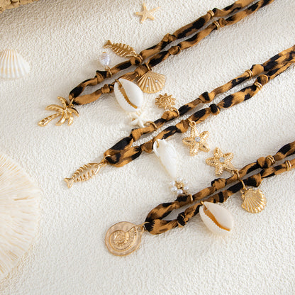 Collar con colgante de estrella de mar y caracola de playa de moda