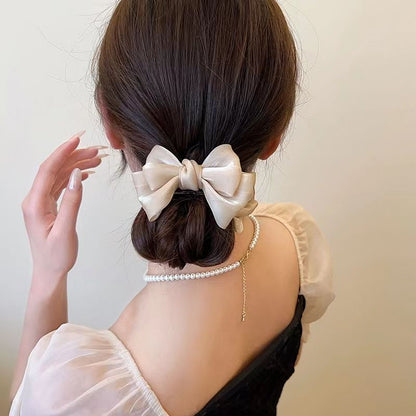 Elegante broche con lazo de color liso para mujer