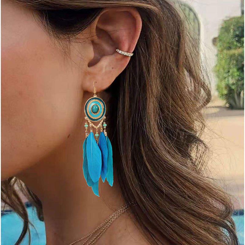 Pendientes bohemios con borlas de plumas exageradas