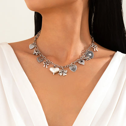 Collar de corazón con lazo de aleación para mujer