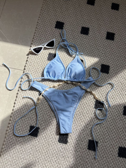 Traje de baño de bikini con cuello halter y cadena de conchas de color sólido sexy a la moda para mujer