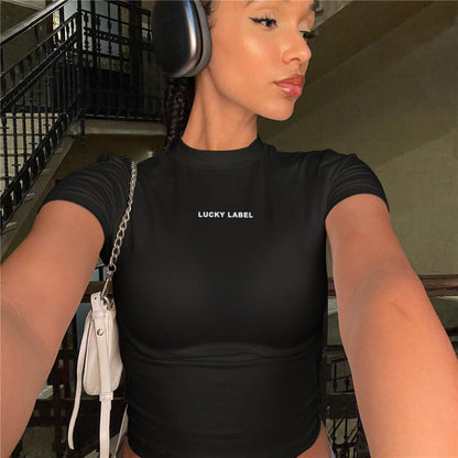Top corto de manga corta con cuello redondo y estampado de letras sexy para mujer