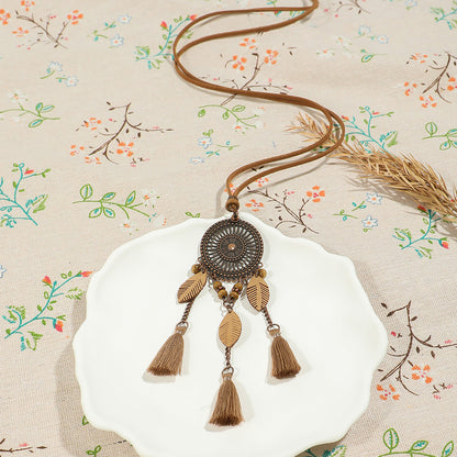 Collar largo con colgante de borla hueca, estilo retro, hecho a mano, para mujer