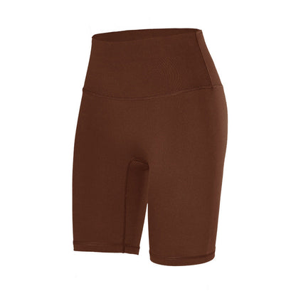 Pantalones cortos de yoga de cintura alta de color liso para mujer