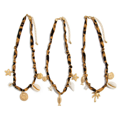 Collar con colgante de estrella de mar y caracola de playa de moda