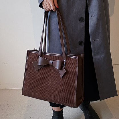Bolso de mano de verano para mujer, de color liso y moderno.