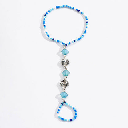 Pied extensible en perles de riz et coquillages tissés de Bohême