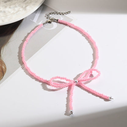 Collar bohemio con cuentas de arroz y lazo para mujer