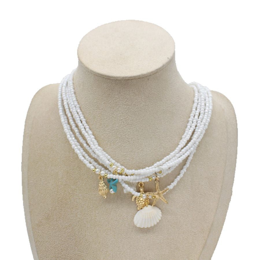 Collar con colgante de estrella de mar y cuentas de moda para mujer con detalles de aleación.
