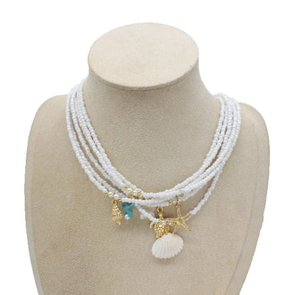 Collar con colgante de estrella de mar y cuentas de moda para mujer con detalles de aleación.