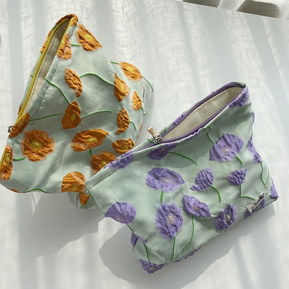 Elegante neceser con estampado de flores y cremallera