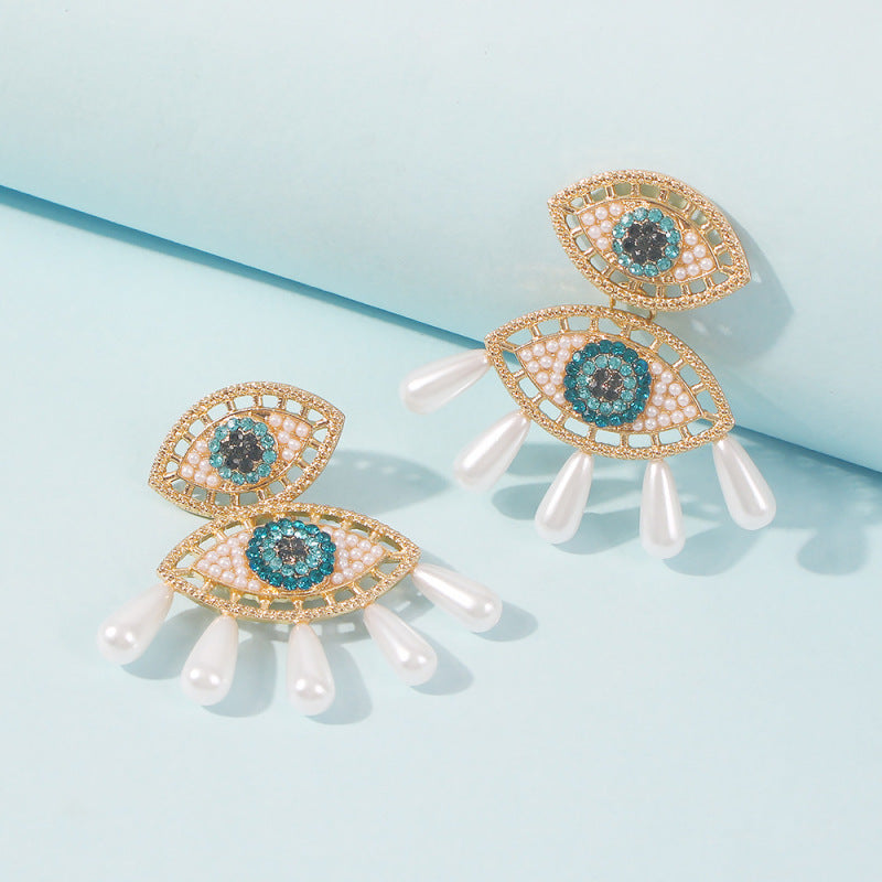 Pendientes de ojo de diablo con perlas de imitación de diamantes de imitación para mujer