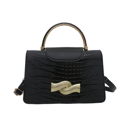 Bolso de piel de cocodrilo con hebilla de metal en color liso para mujer