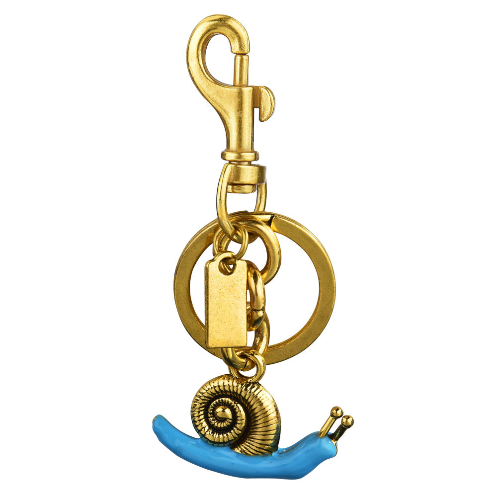 Llavero con colgante de bolso de caracol de moda, aleación orgánica marina, accesorios de moda
