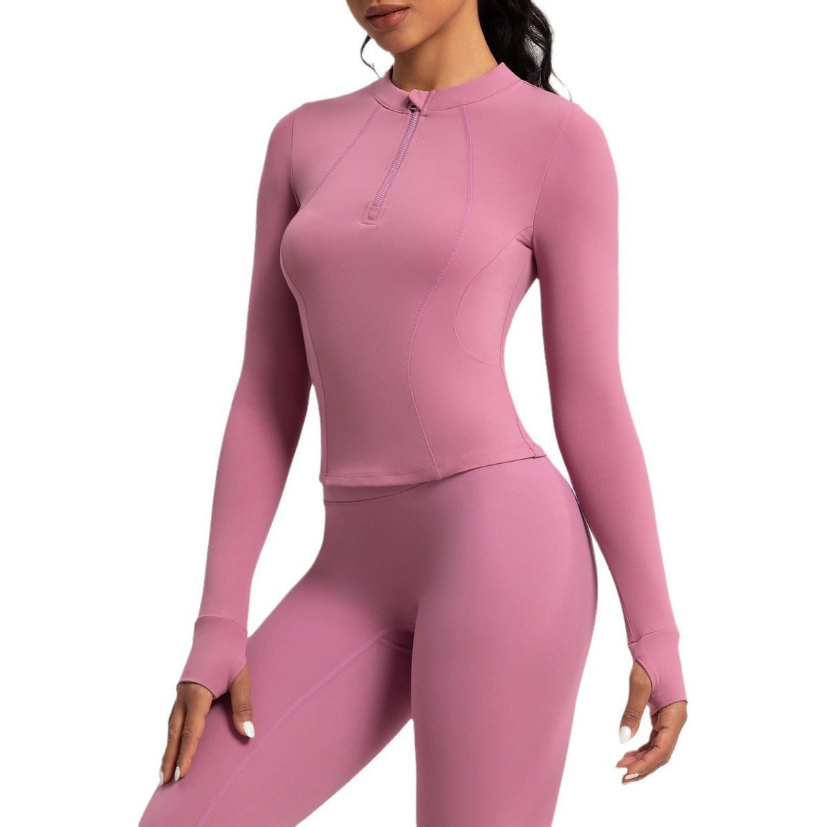Top de yoga de manga larga con media cremallera de color liso a la moda para mujer