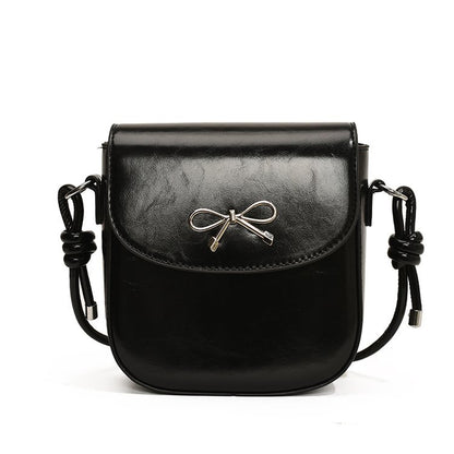 Mini bolso bandolera con lazo de color liso a la moda