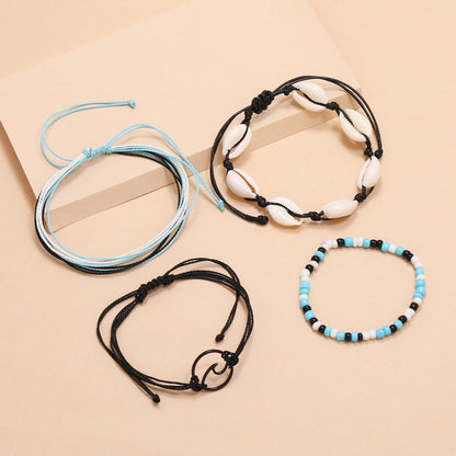Conjunto de tobilleras multicapa con cuentas de concha y ondas bohemias