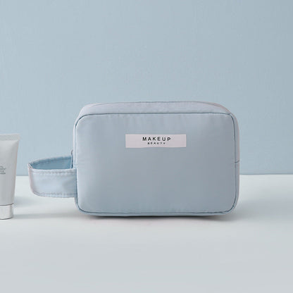 Bolsa de cosméticos portátil de viaje de color sólido simple