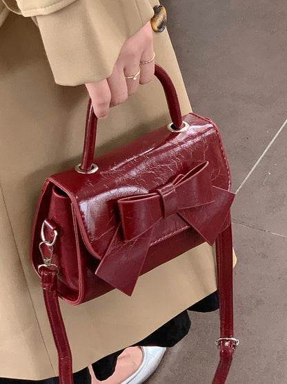 Bolso de mano pequeño cuadrado con lazo de color liso elegante para mujer