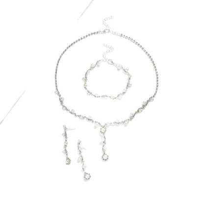 Conjunto de joyas de perlas y diamantes de imitación con temperamento de moda