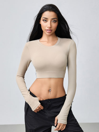T-shirt de yoga moulant dos nu à manches longues et ajouré