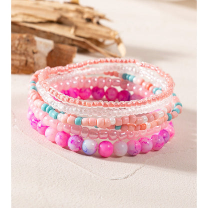 Conjunto de pulseras en capas con minicuentas multicolores bohemias