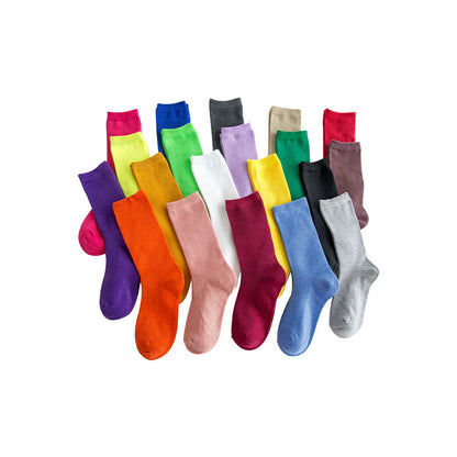 Calcetines de tubo de color liso sencillos a la moda para mujer