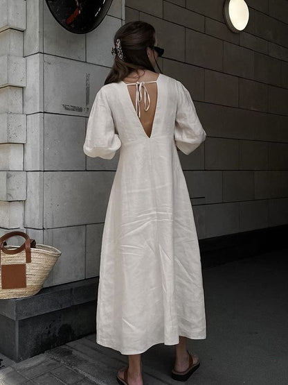 Elegante vestido de lino y algodón con escote en V en color liso