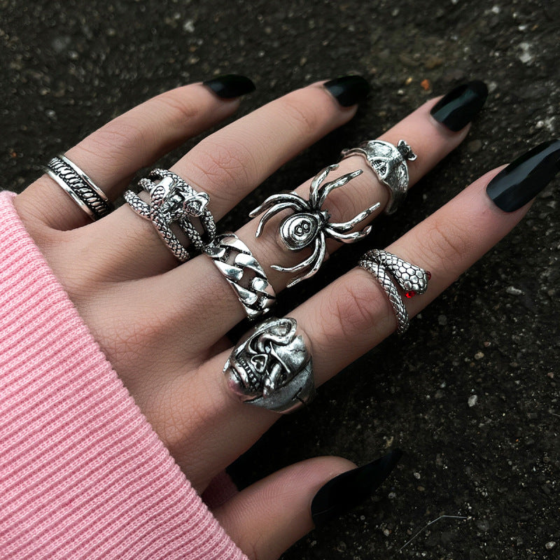 Conjunto de anillos de esqueleto gótico punk creativo de dos cabezas para mujer