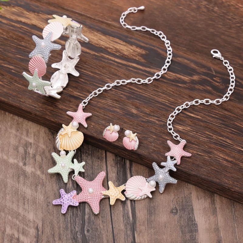 Conjunto de joyas de concha y estrella de mar: collar, pendientes y pulsera