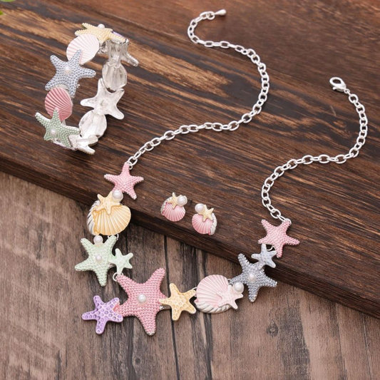 Conjunto de joyas de concha y estrella de mar: collar, pendientes y pulsera