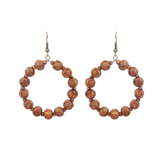 Pendientes de borlas hechos a mano con cuentas de madera bohemias
