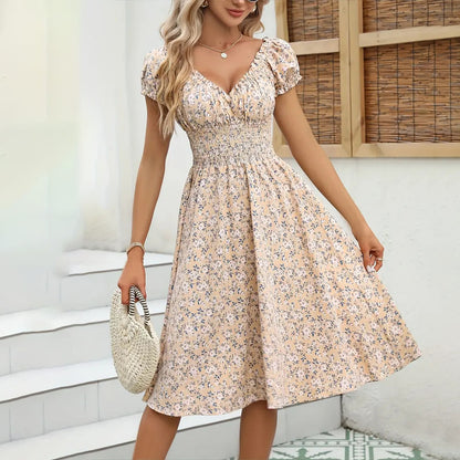 Elegante vestido con cuello en V y mangas abullonadas con estampado floral