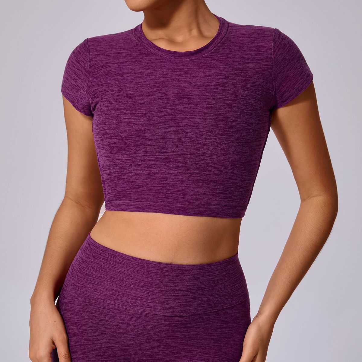 Top de yoga de manga corta de color liso sexy para mujer