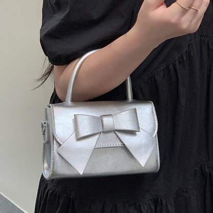Bolso de mano pequeño cuadrado con lazo de color liso elegante para mujer