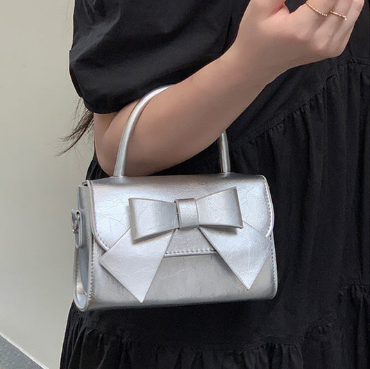 Bolso de mano pequeño cuadrado con lazo de color liso elegante para mujer