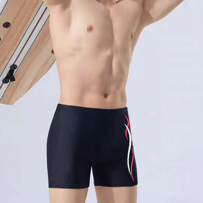 Traje de baño de ángulo plano con estampado de letras y colores a juego para hombre