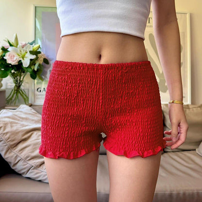 Pantalones cortos plisados ​​de color sólido sexys de moda para mujer