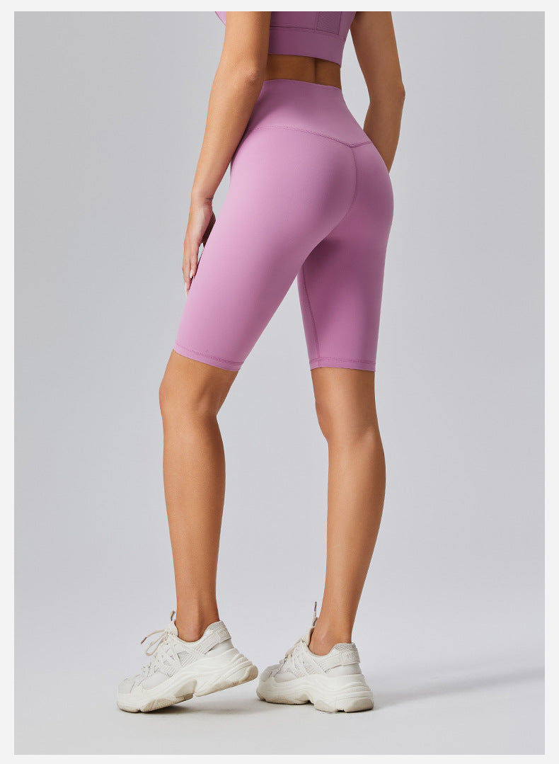 Pantalones cortos de yoga de cintura alta de color liso para mujer